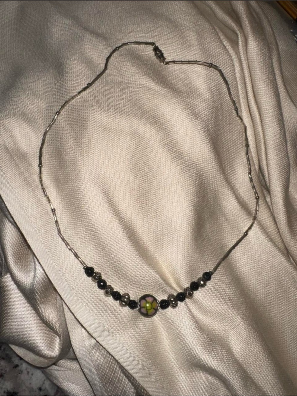 Handmade Black Beaded Necklace with Green Flower Accent